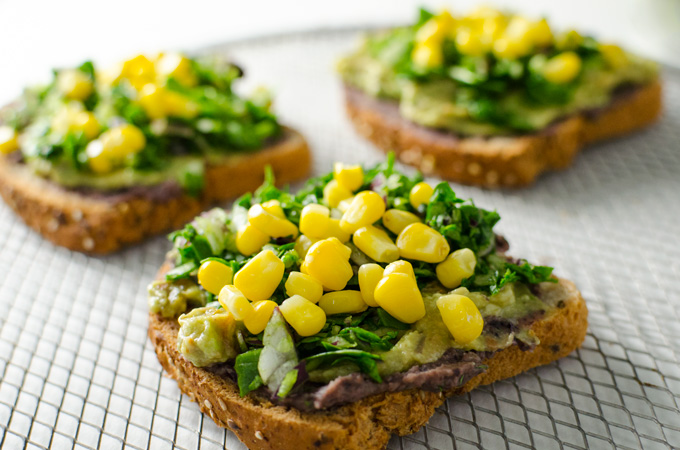 Nacho Avocado Toast on a pizza screen