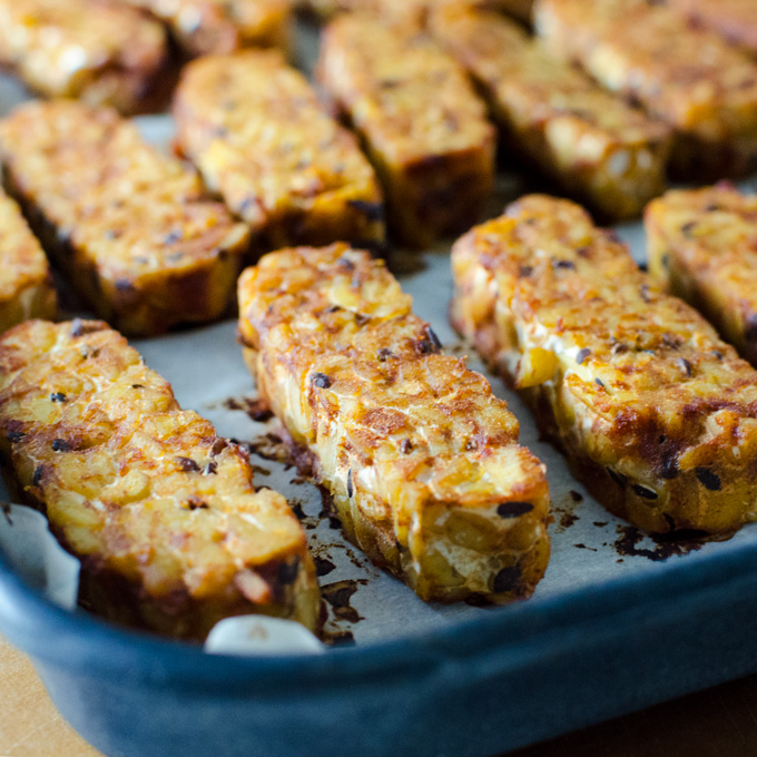 Baked BBQ Tempeh - this quick and easy recipe makes a delicious meat substitute in a variety of gluten-free vegan dishes | VeggiePrimer.com