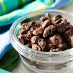 glass bowl of homemade chocolate covered raisins